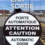 Signage for automatic door